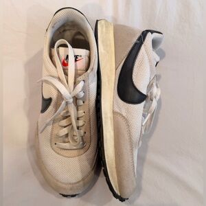 Nike Cream and Black Running Shoes